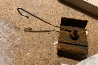 The remains of the sacrificial anode